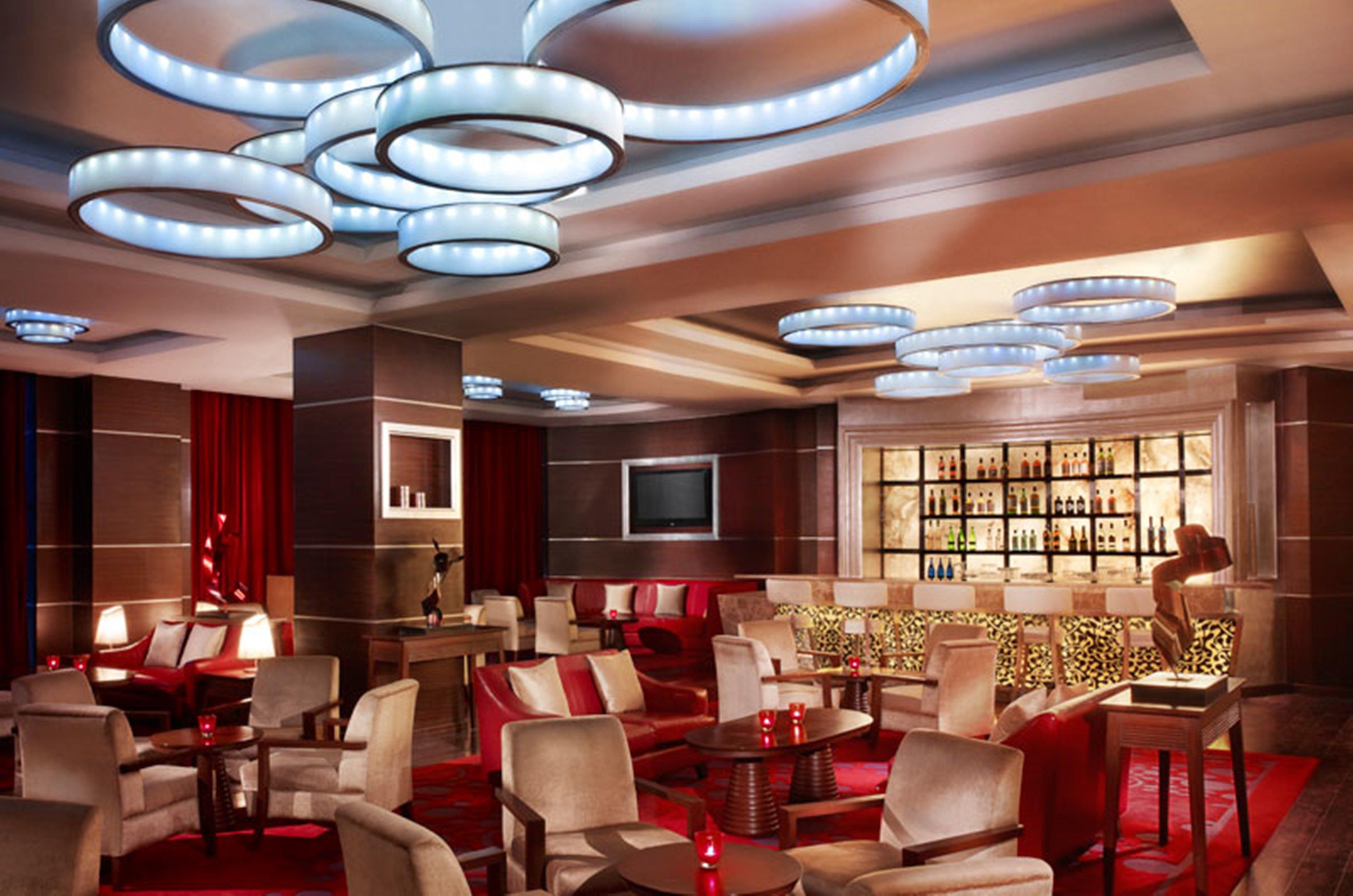 Hyatt Centric Janakpuri New Delhi Hotell Exteriör bild The interior of the lounge